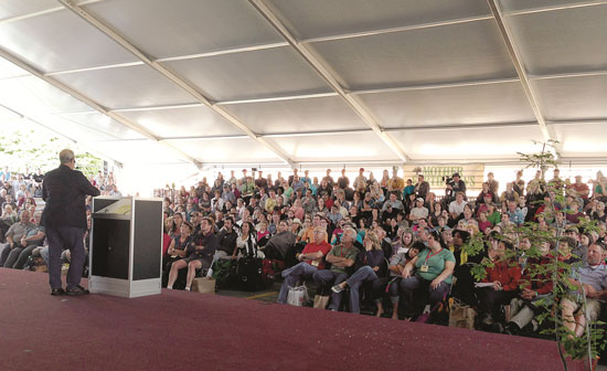 Joel Salatin delivers his keynote speech at the MOTHER EARTH NEWS FAIR in Puyallup, Wash., in June.